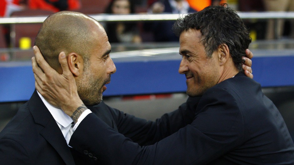 Bayern Munich's Spanish head coach Pep Guardiola (L) and Barcelona's coach Luis Enrique greet each other before the UEFA Champions League football match FC Barcelona vs FC Bayern Muenchen at the Camp Nou stadium in Barcelona on May 6, 2015.     AFP PHOTO/ QUIQUE GARCIA        (Photo credit should read QUIQUE GARCIA/AFP/Getty Images)